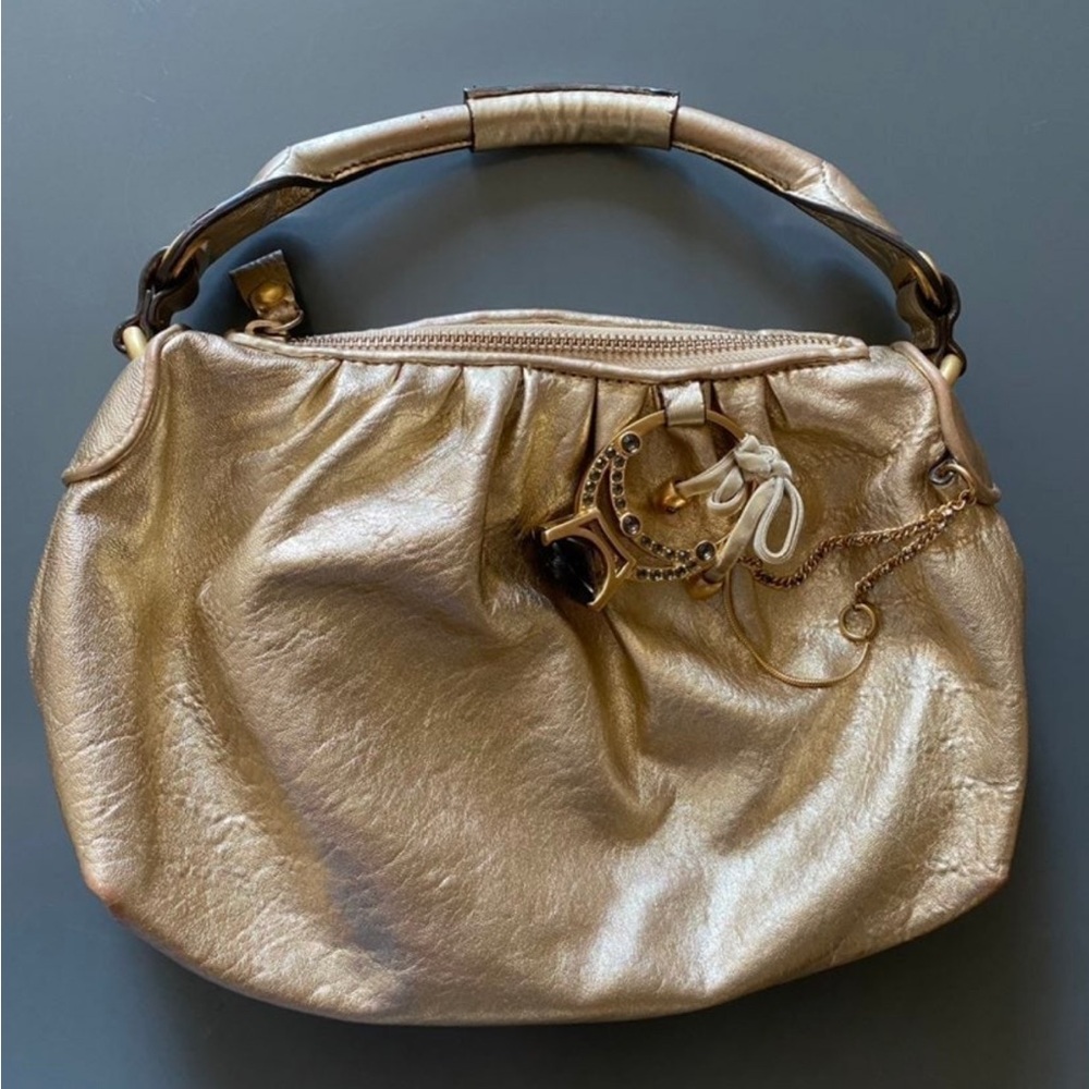 Juicy Couture vintage metallic gold bag with bling ring